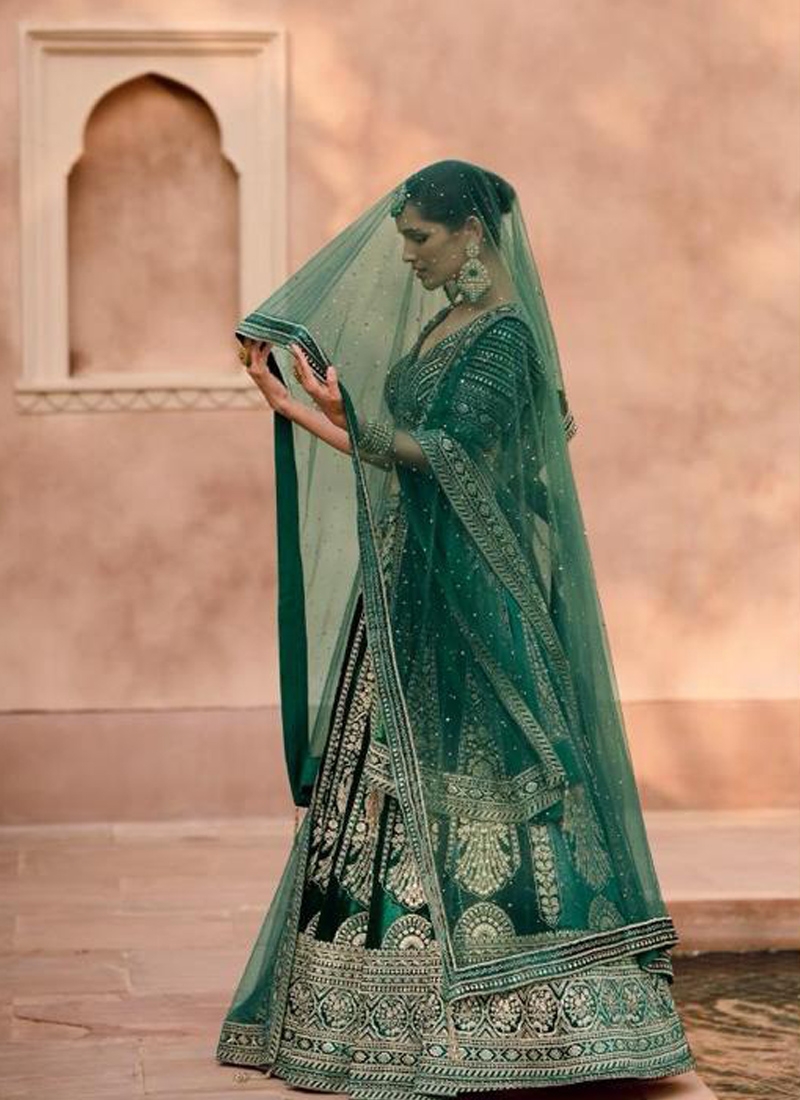 Pure viscose silk lehenga with crystal work in green