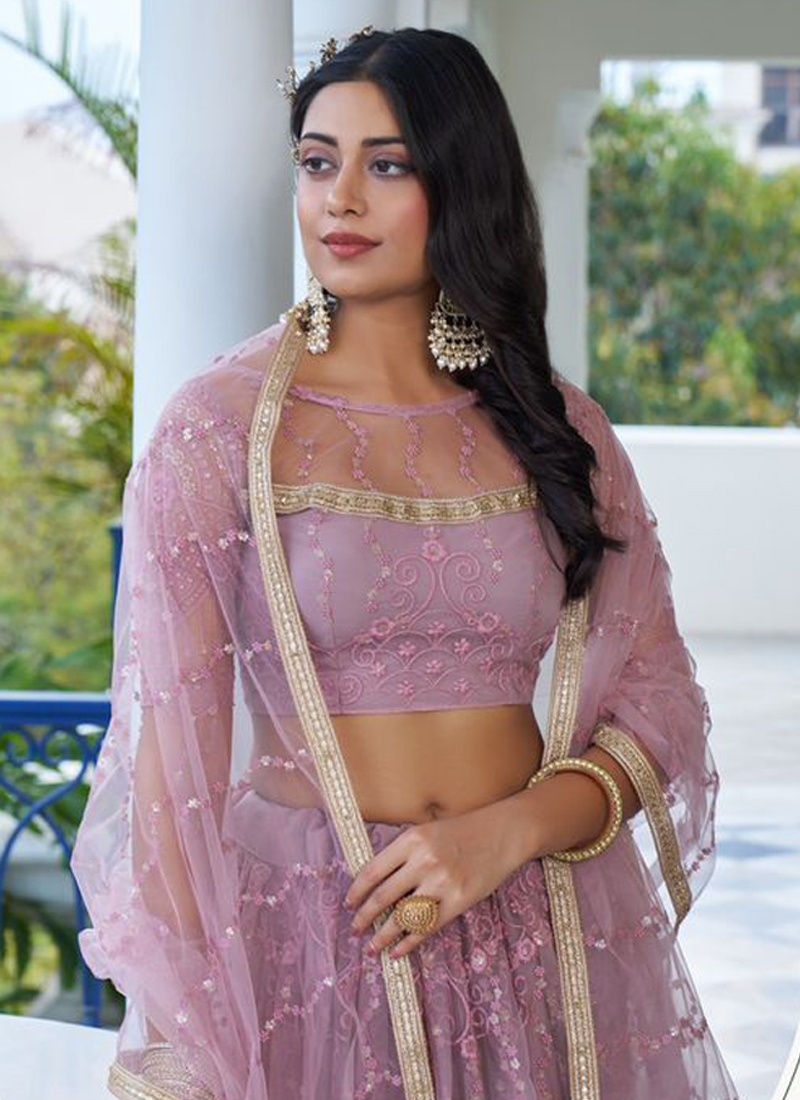 New butterfly net lehenga with heavy thread embroidery in dusty pink