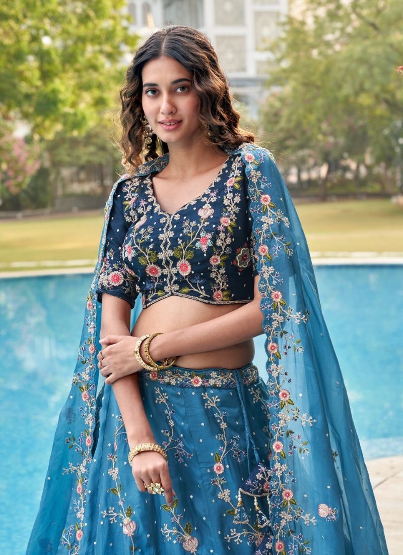 Beautiful lehenga choli with mirror and stone work in blue