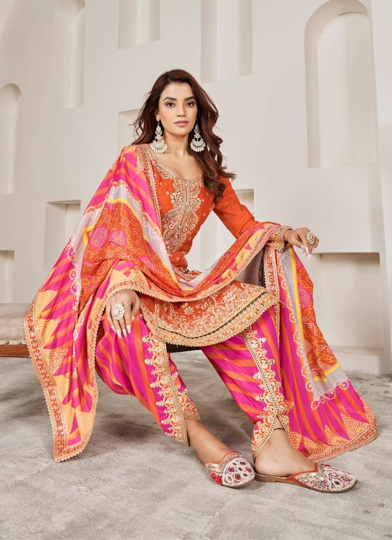 Exquistic punjabi style salwar kurta in orange