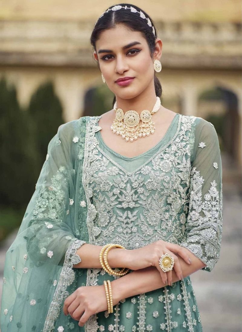 Beautiful butterfly net anarkali with stone work in light green