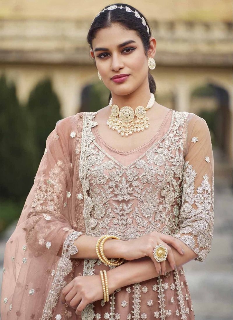 Beautiful butterfly net anarkali with stone work in peach