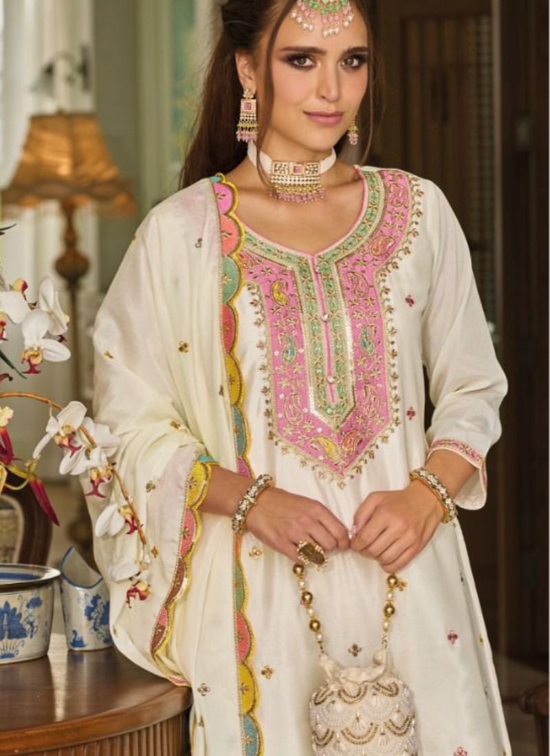 Beautiful palazzo suit with heavy floral embroidery in white