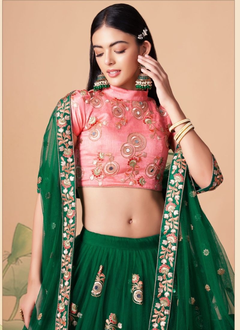 Soft net embroidered lehenga choli with mirror embroidery in dark green