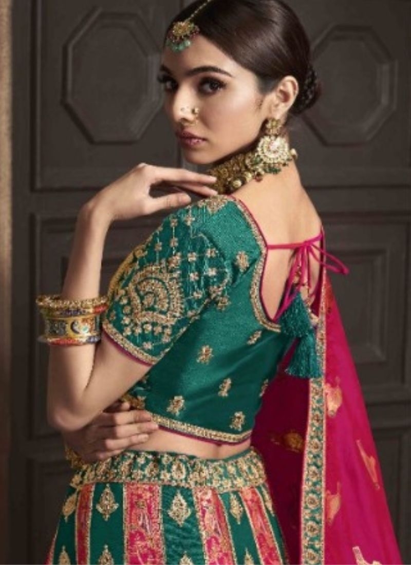 Designer lehenga with beautiful embroidered dupatta in dark green