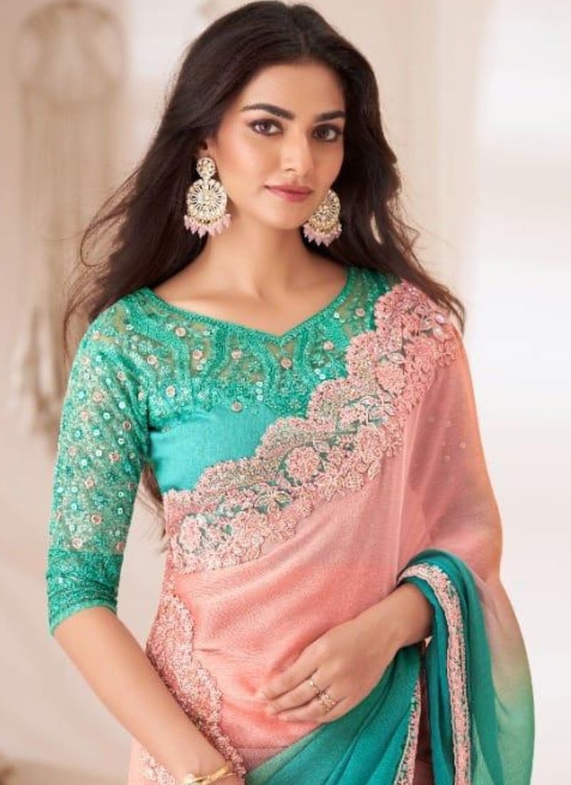 Designer silk saree with embroidered blouse in light green