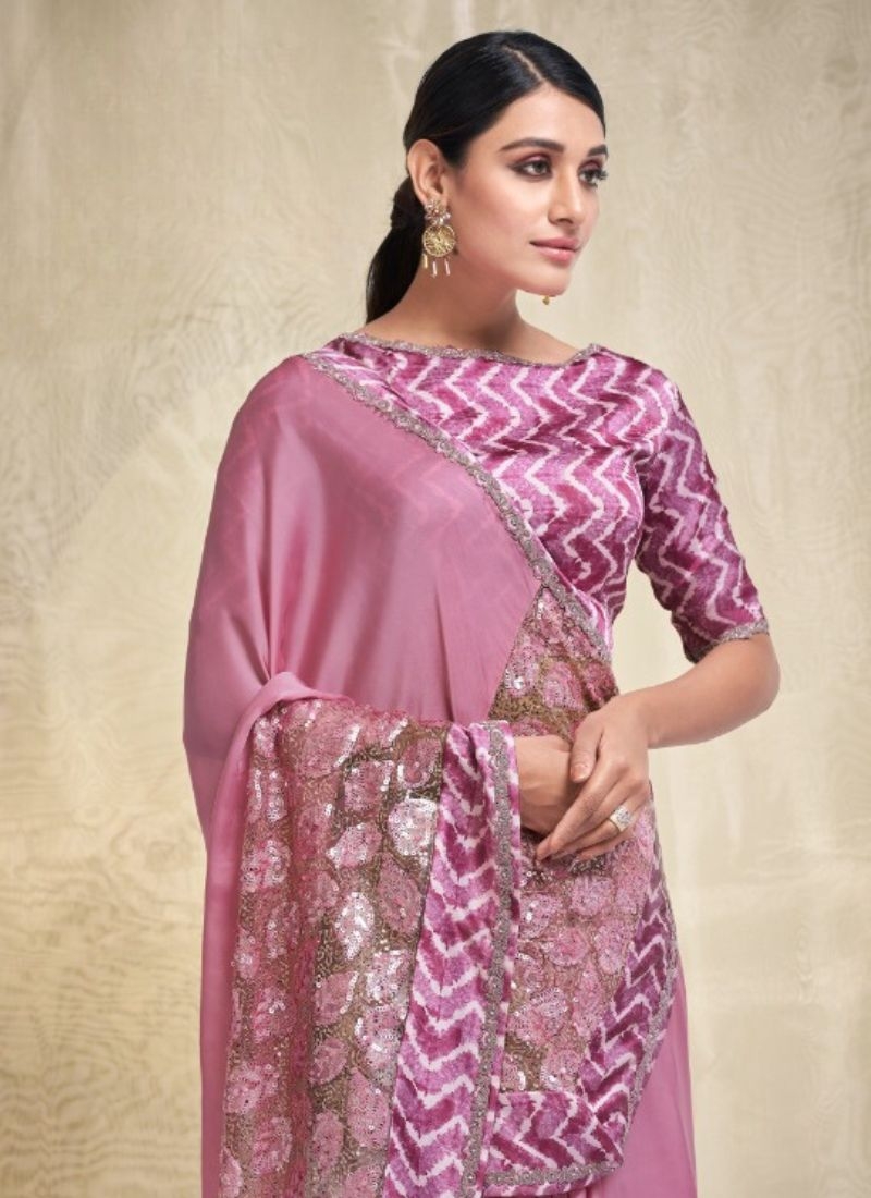 Exquisite wedding saree with embroidered blouse in pink