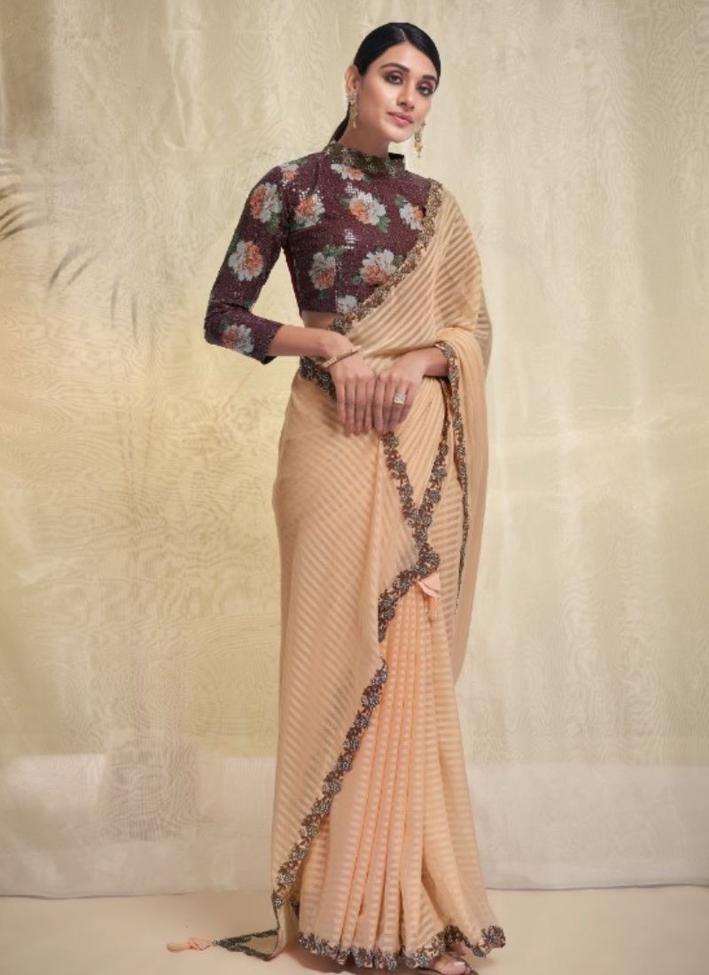 Exquisite wedding saree with embroidered blouse in cream