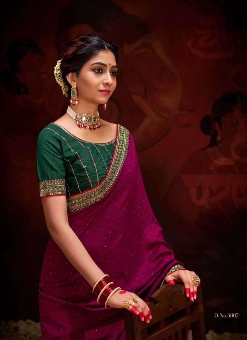 Trendy silk saree with beautifully embroidered blouse in magenta