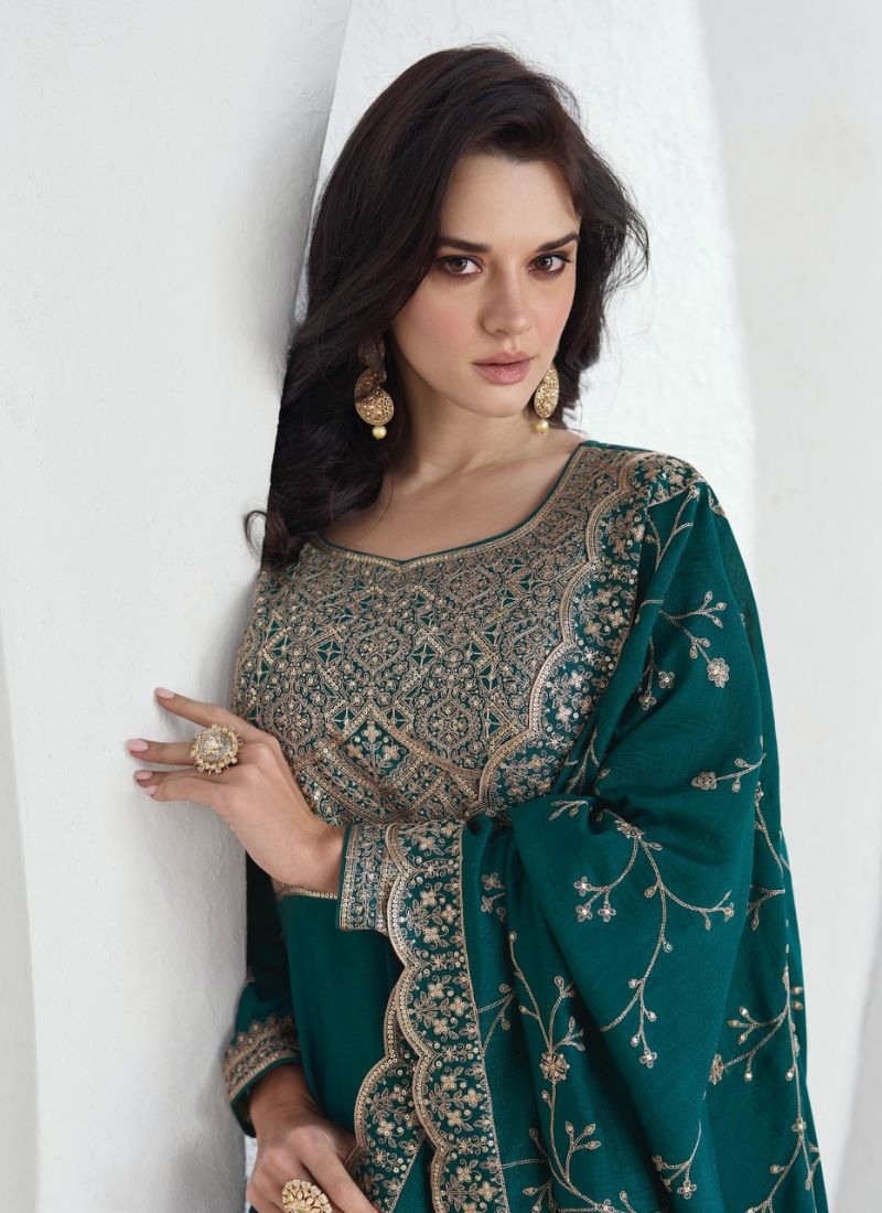 Beautiful silk anarkali suit with mirror work embroidery in dark green