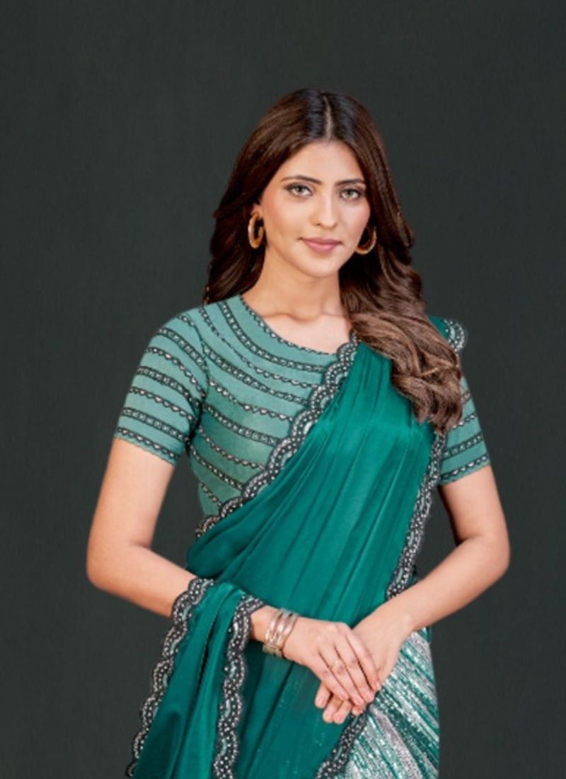 Designer embroidered silk saree in green