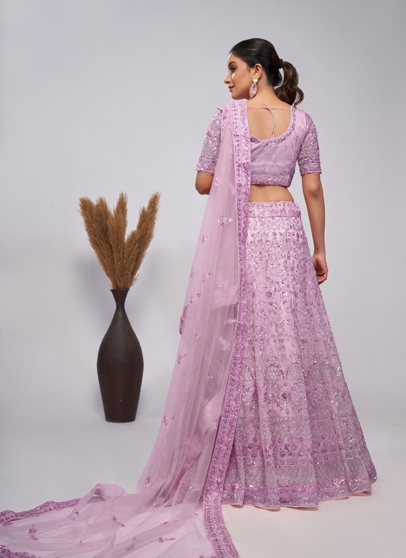 Stunning lehenga adorned by pearl and sequins bridal lehenga in light purple