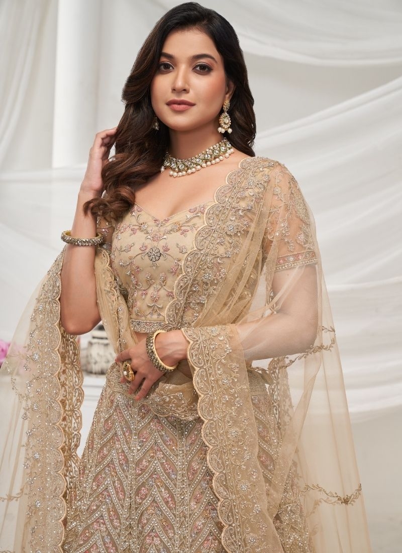 The bagh collection: white fawn peacock Embroidered bridal lehenga in light brown