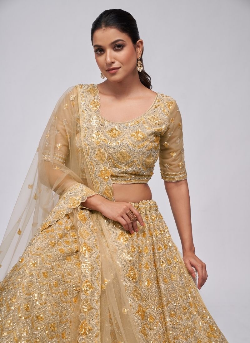 The dazzling lehenga is perfect for the contemporary bride. in mustard