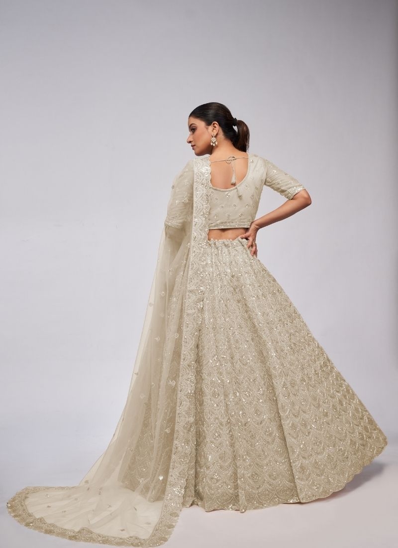 The dazzling lehenga is perfect for the contemporary bride. in beige