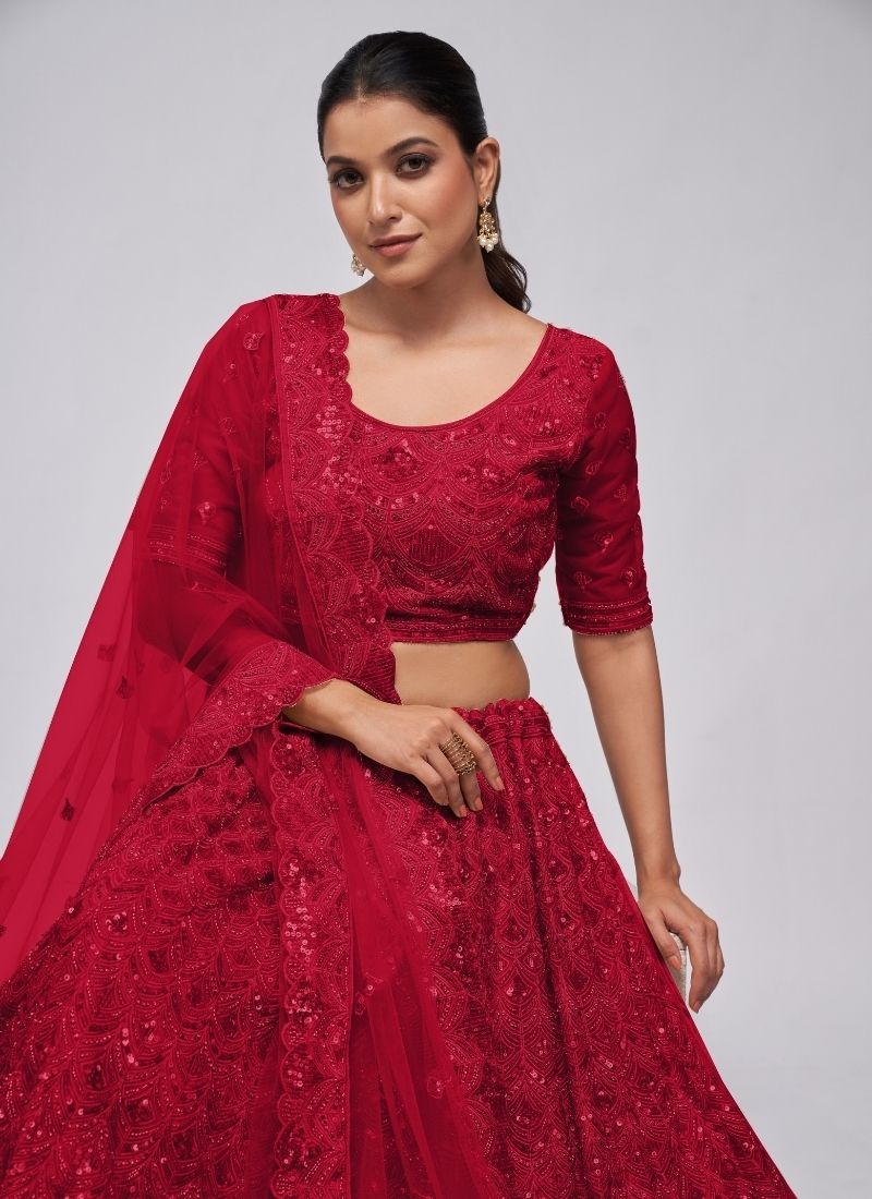 The dazzling lehenga is perfect for the contemporary bride. in red