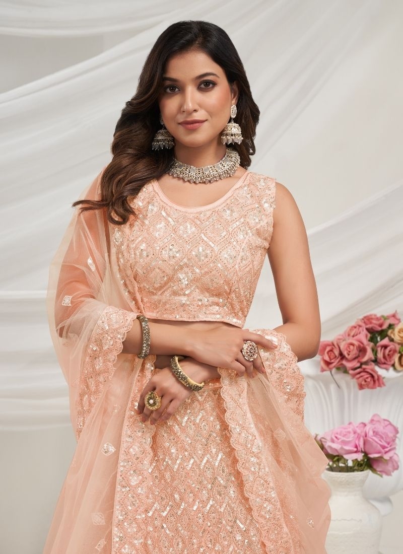 Exquisite Diamond Pattern Stone & Cut Daana Embroidered Bridal Lehenga in peach