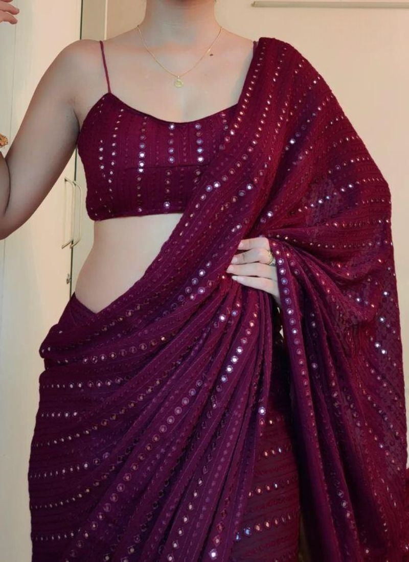 Stunning embroidered georgette saree in maroon