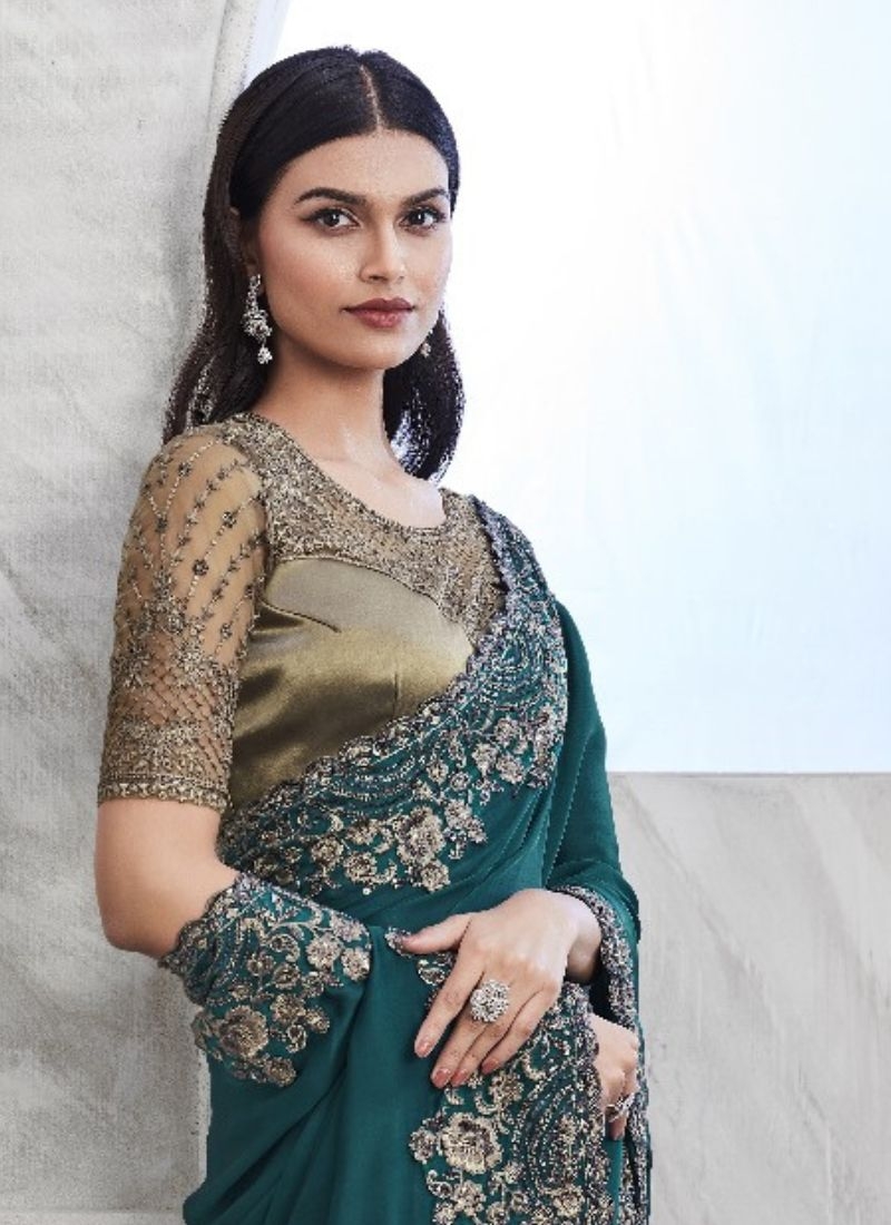 Exquisite embroidered silk saree in dark green