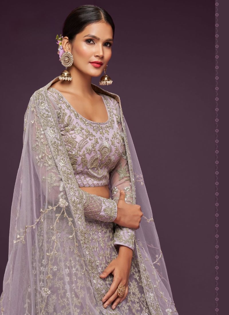 The gorgeous embroidered net lehenga choli in light purple