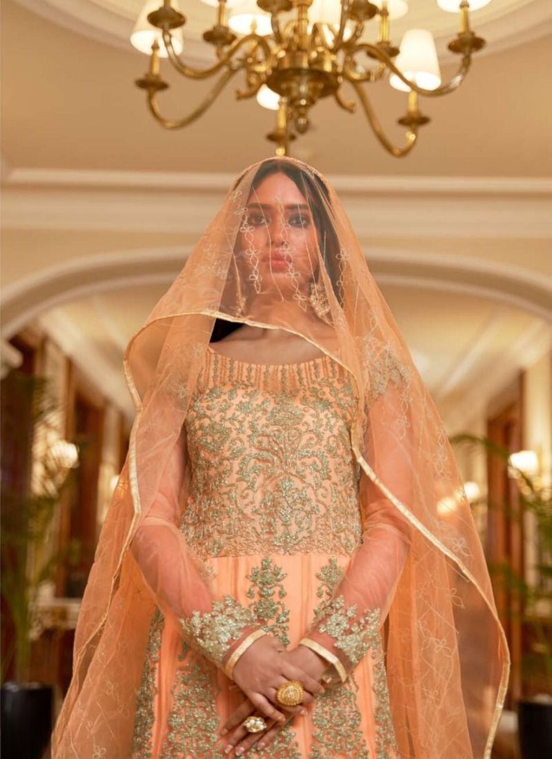 Exquisite embroidered gown in light orange