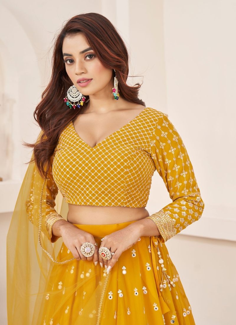 Exquisite embroidered georgette lehenga choli in yellow