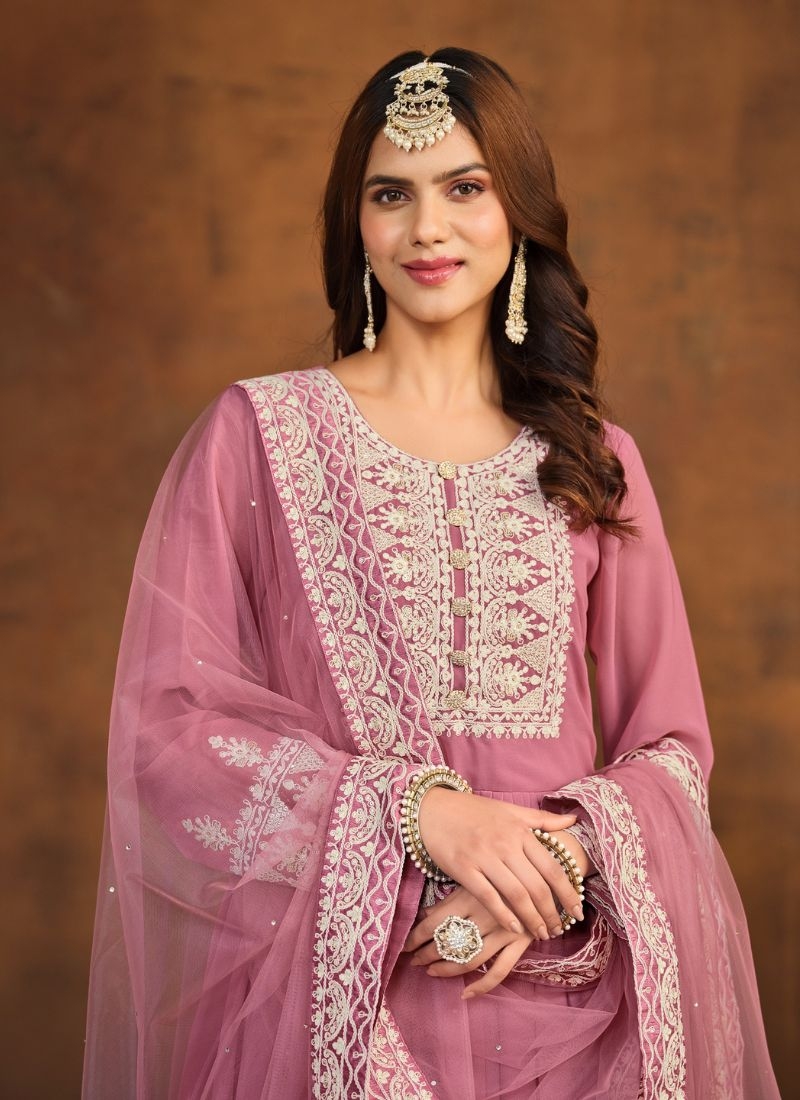 Beautiful embroidered faux georgette palazzo suit in pink