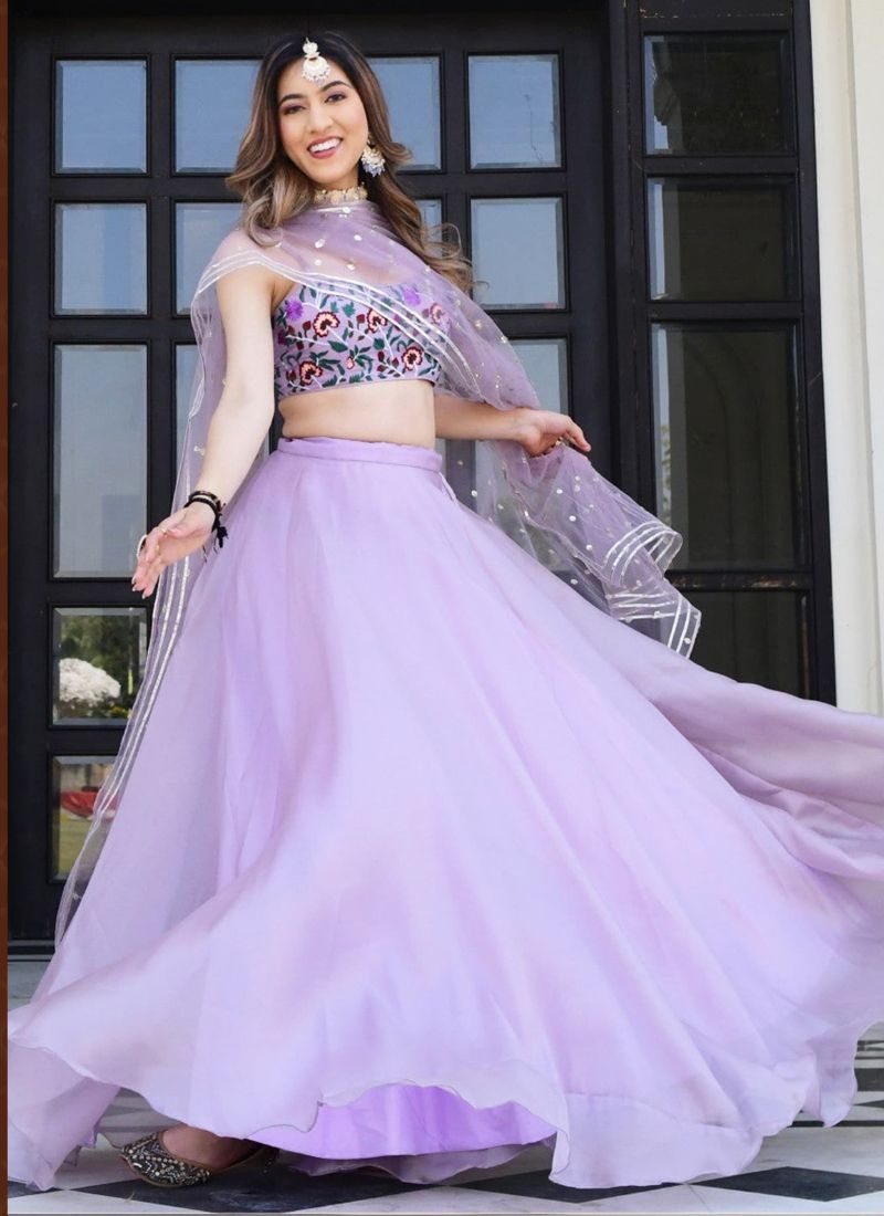 Beautifully embroidered organza silk lehenga choli in purple