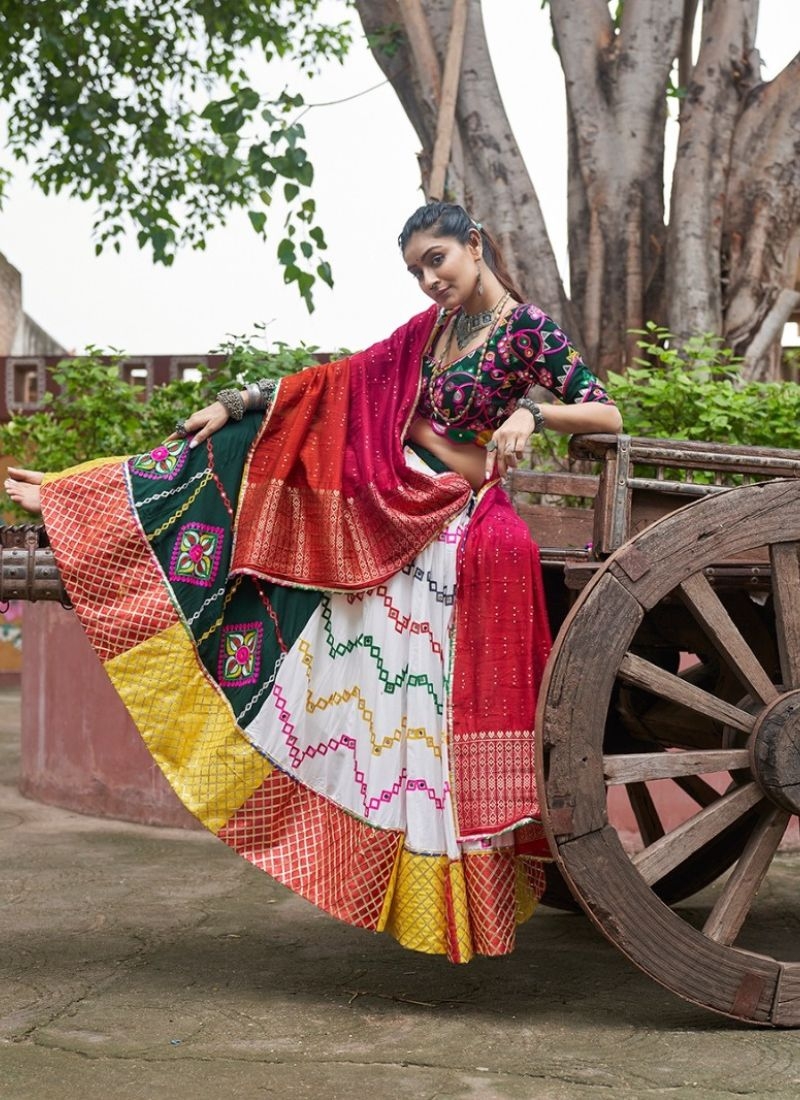 Beautiful mirror embroidered viscose rayon lehenga choli in dark green