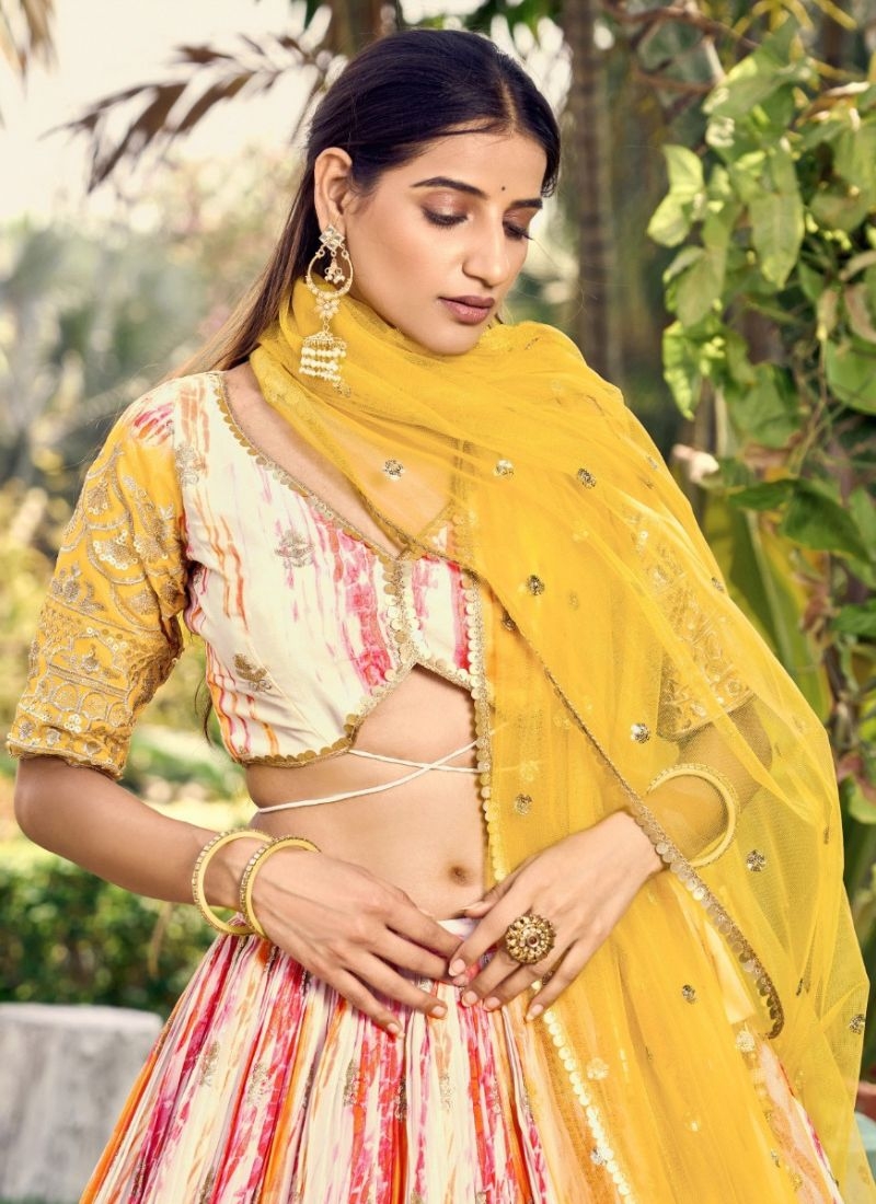 Beautifully digital printed and embroidered Chinon lehenga choli in yellow