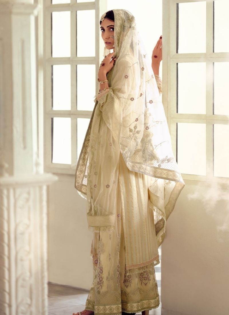 Designer patch embroidered georgette sharara suit in cream