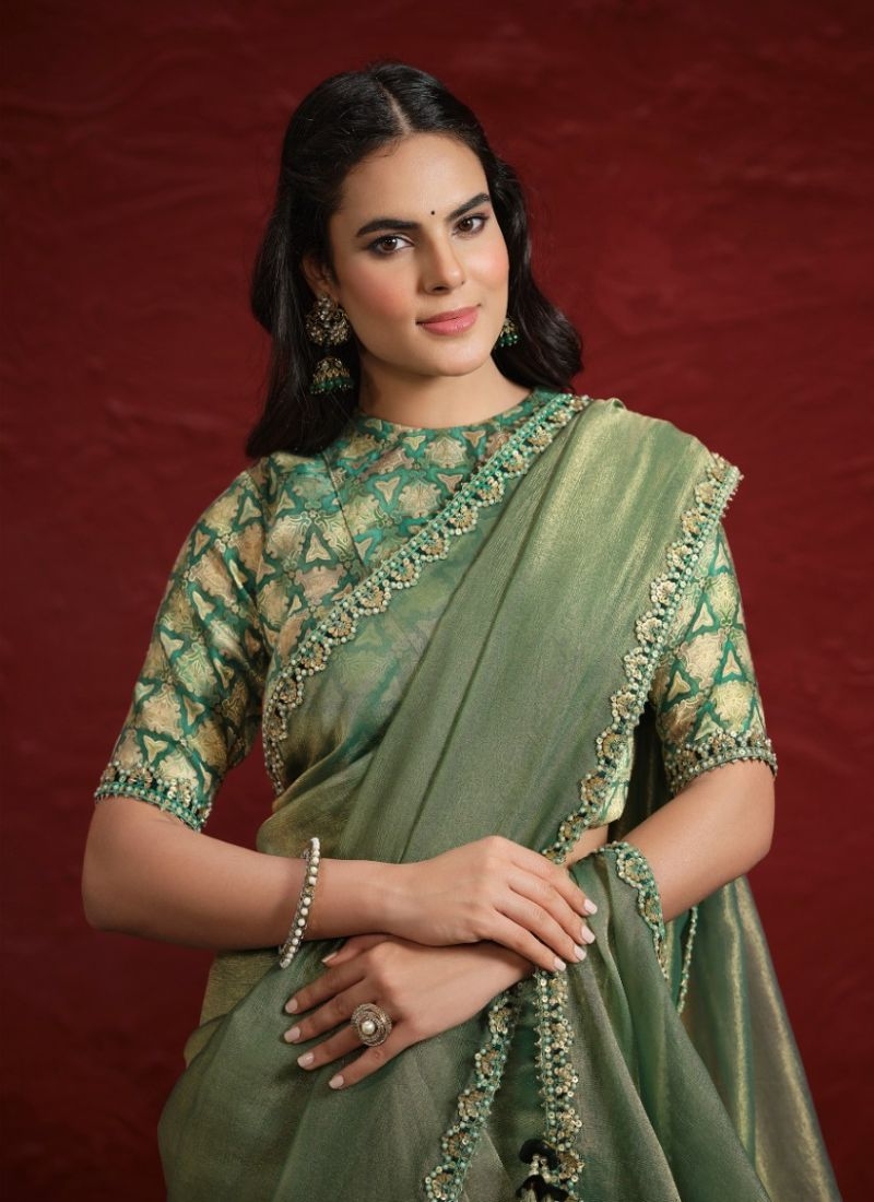 Stunning embroidered silk saree in green