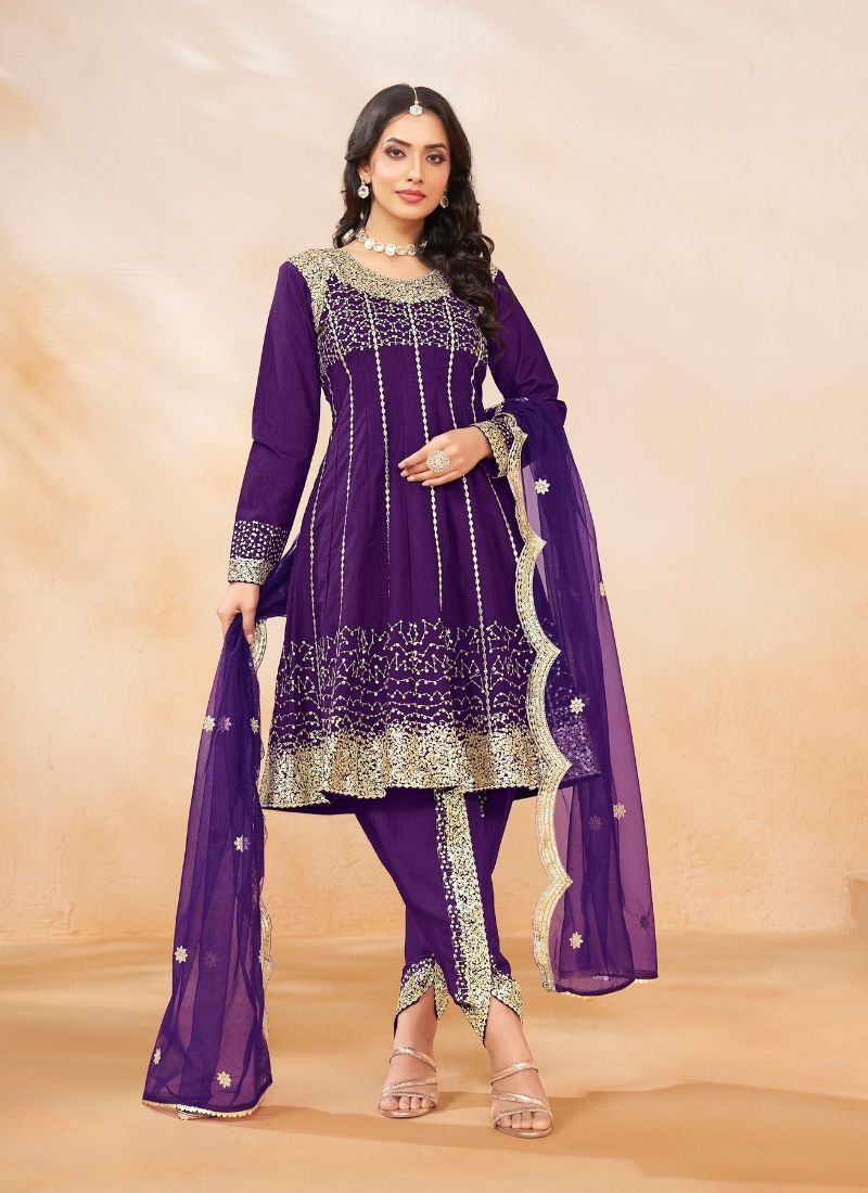 Stunning embroidered silk salwar suit in purple