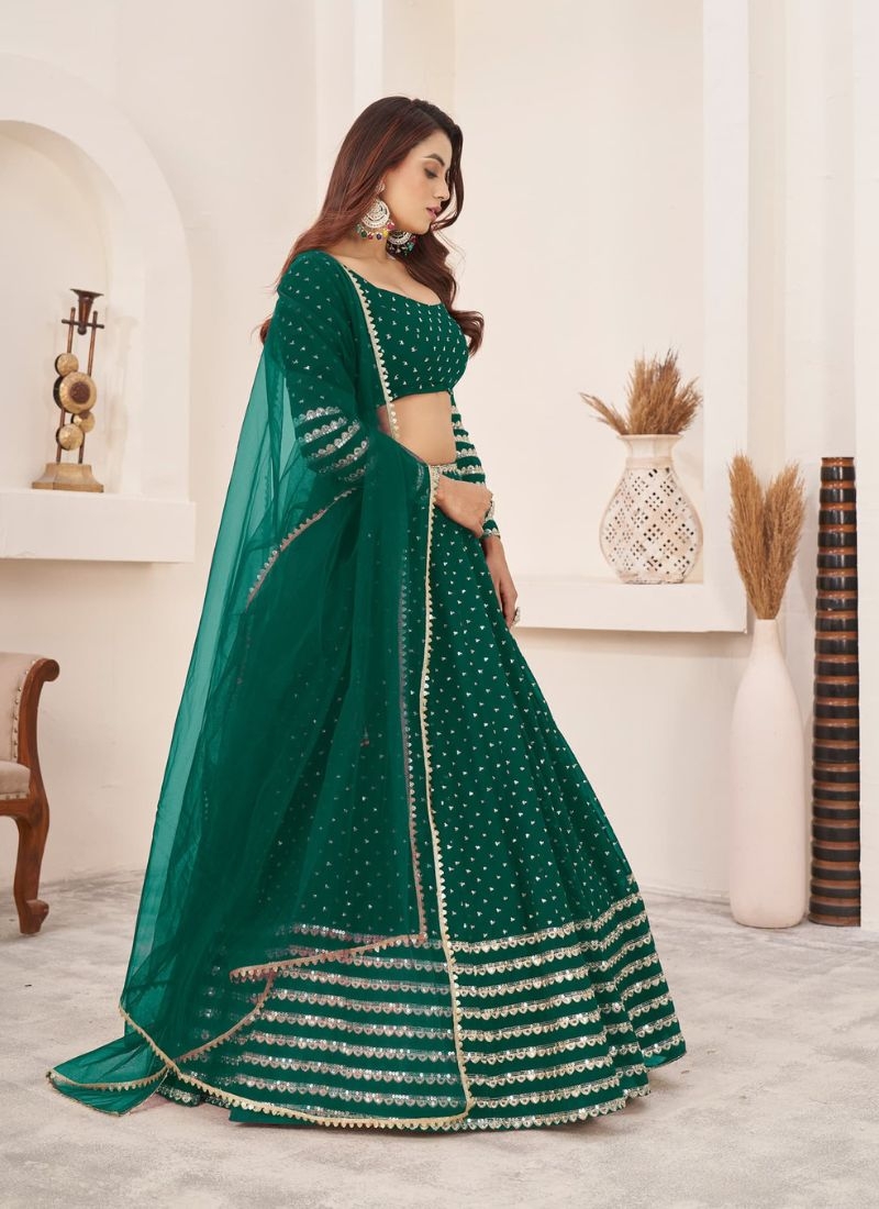 Exquisite embroidered georgette lehenga choli dark green