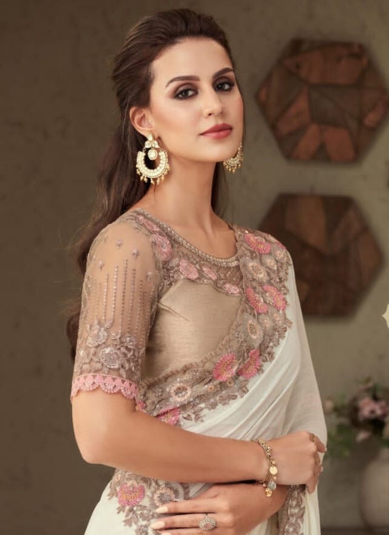 Designer sequin embroidered silk saree in cream