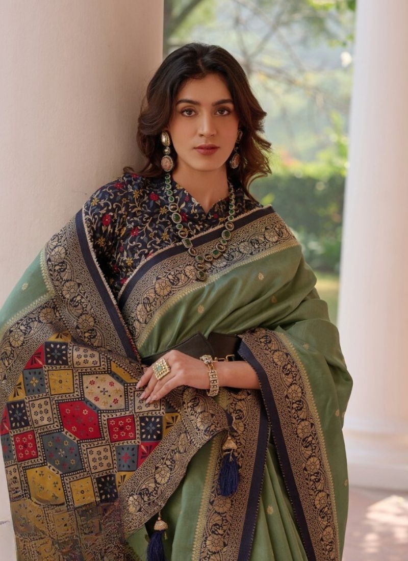 Designer embroidered viscose saree in green