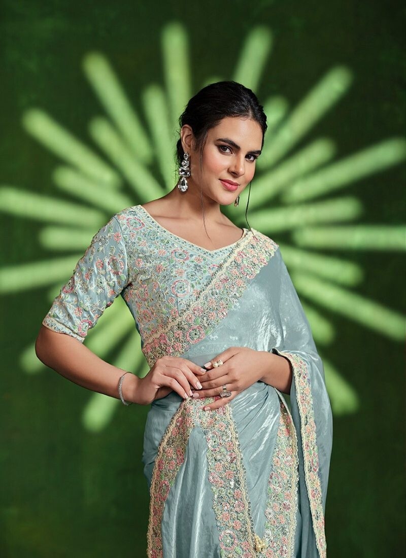 Exquisite handwork embroidered satin silk saree in light blue