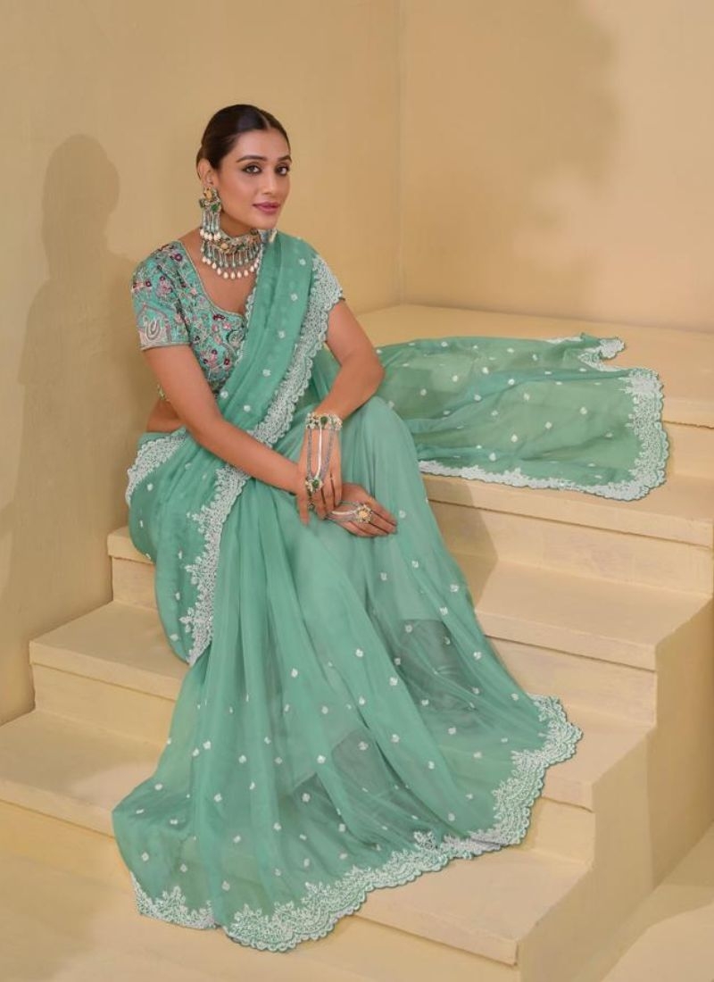 Stunning Heavy embroidered pure silk saree in green