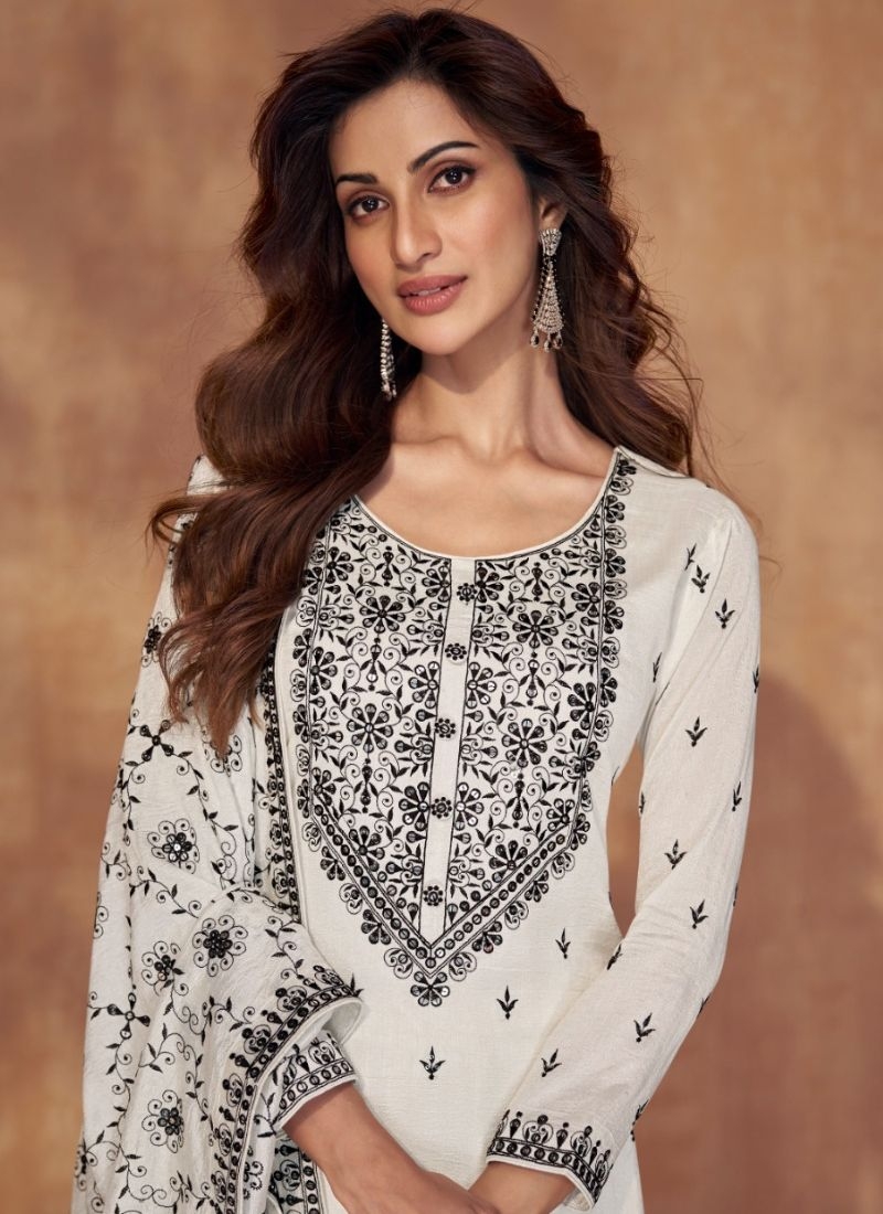 Beautiful thread embroidered silk kurta pant suit in white