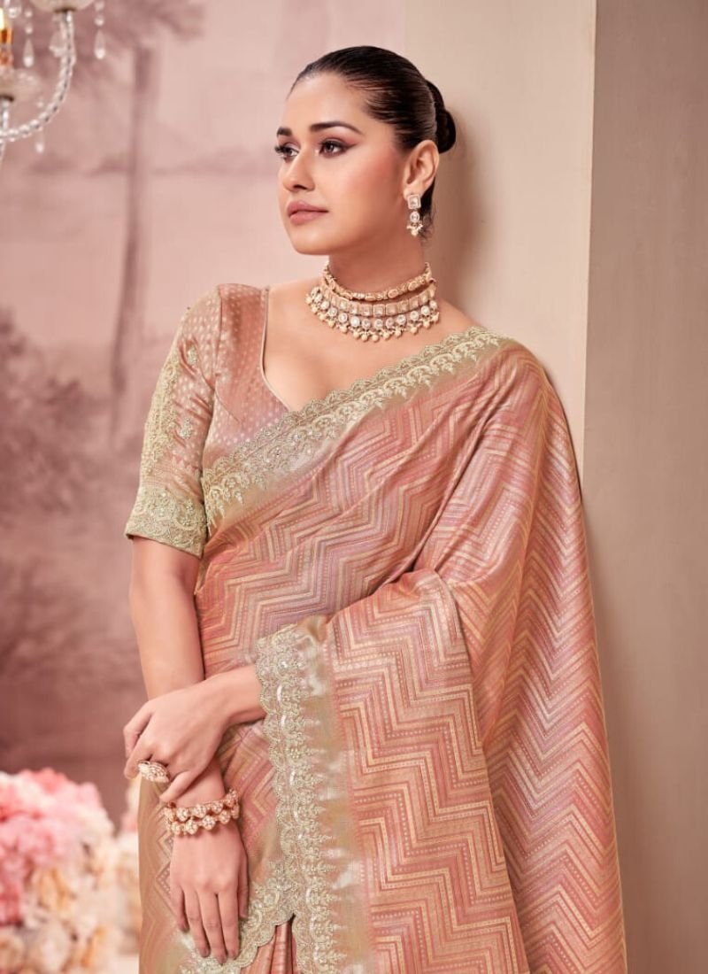 Beautiful embroidered organza silk saree in peach