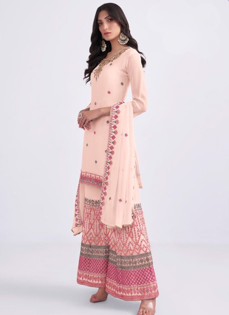 Heavy embroidered georgette sharara suit in baby pink