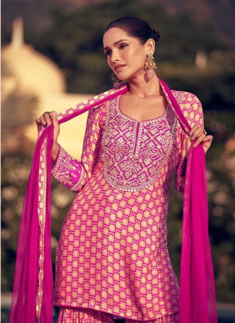 Beautifully embroidered chinon silk sharara suit in red