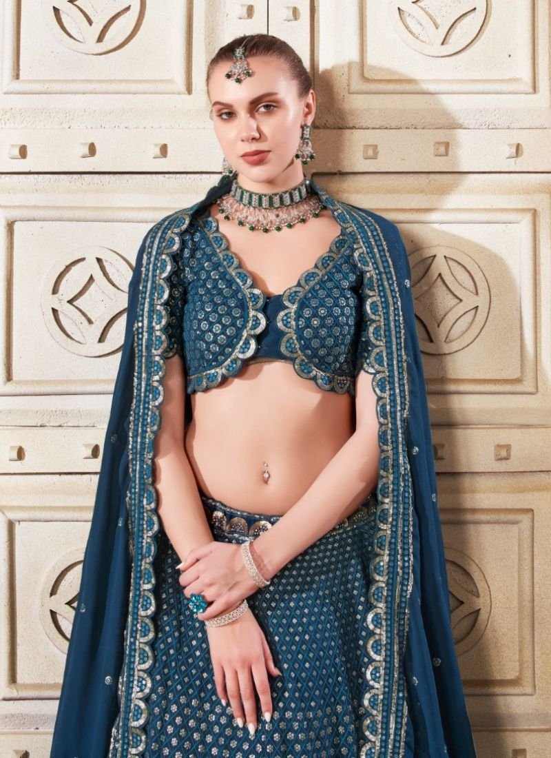 Designer embroidered flared net lehenga in navy blue