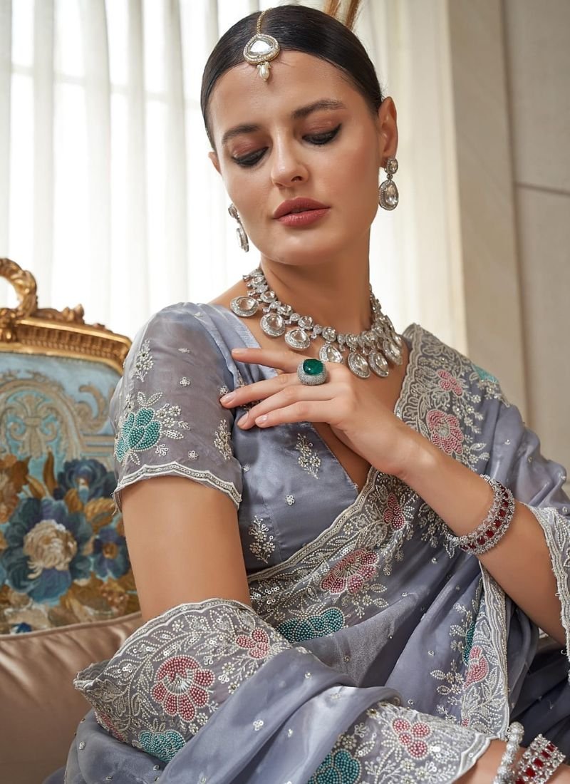 Exquisite hand woven tissue silk saree in grey