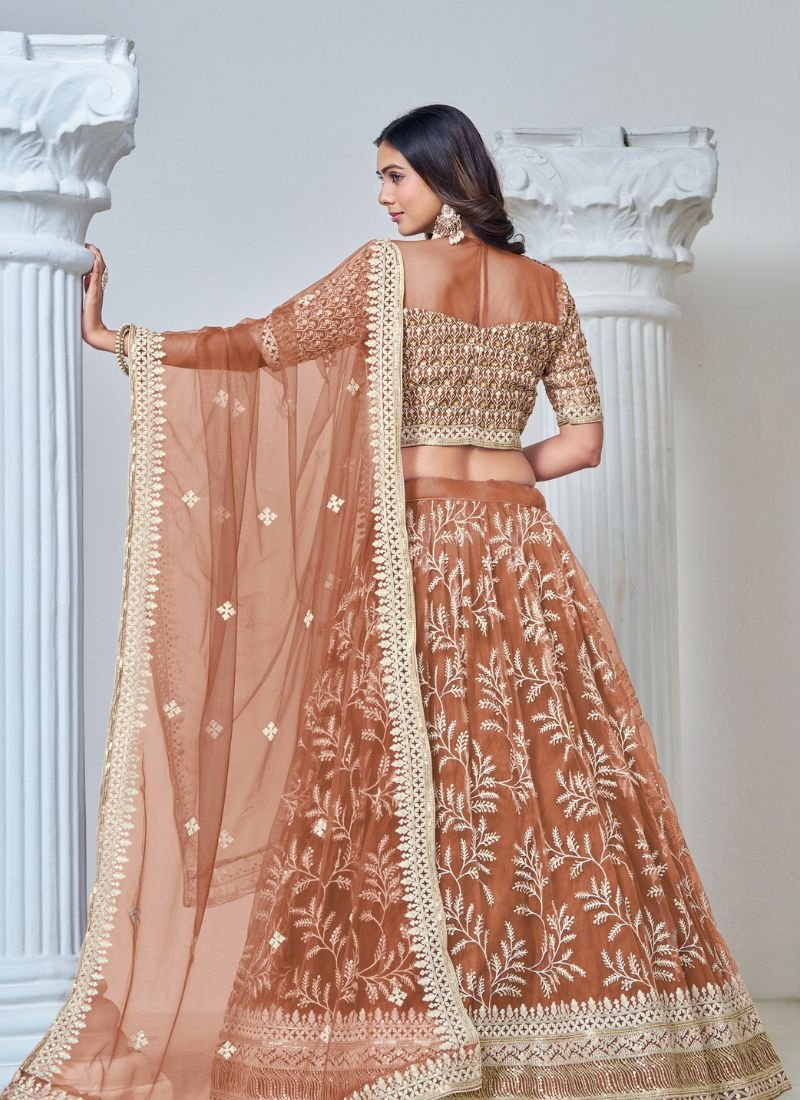 Exquisite heavy thread embroidered net lehenga choli in orange