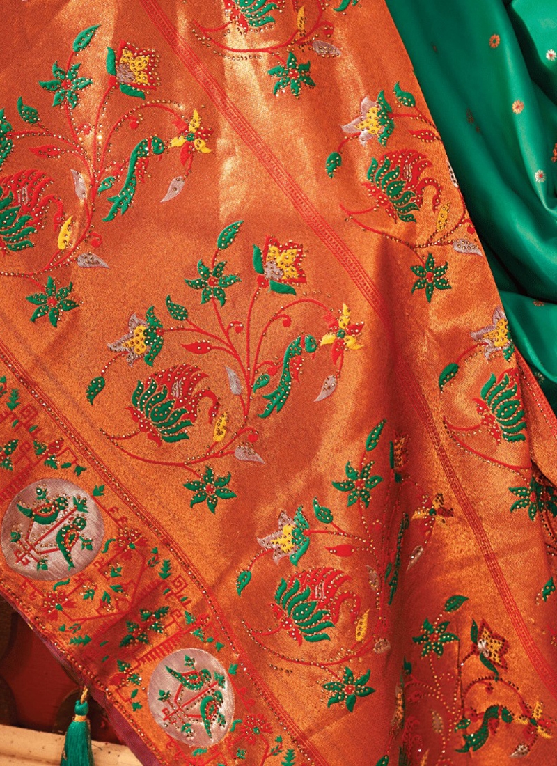 Banarasi silk saree with copper zari in Green