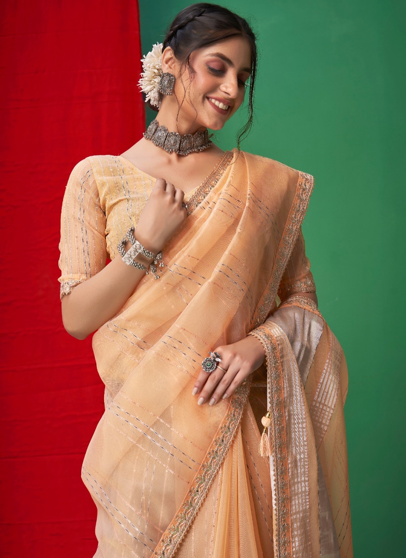 Traditional gotta patti saree with beautiful embroidery in orange