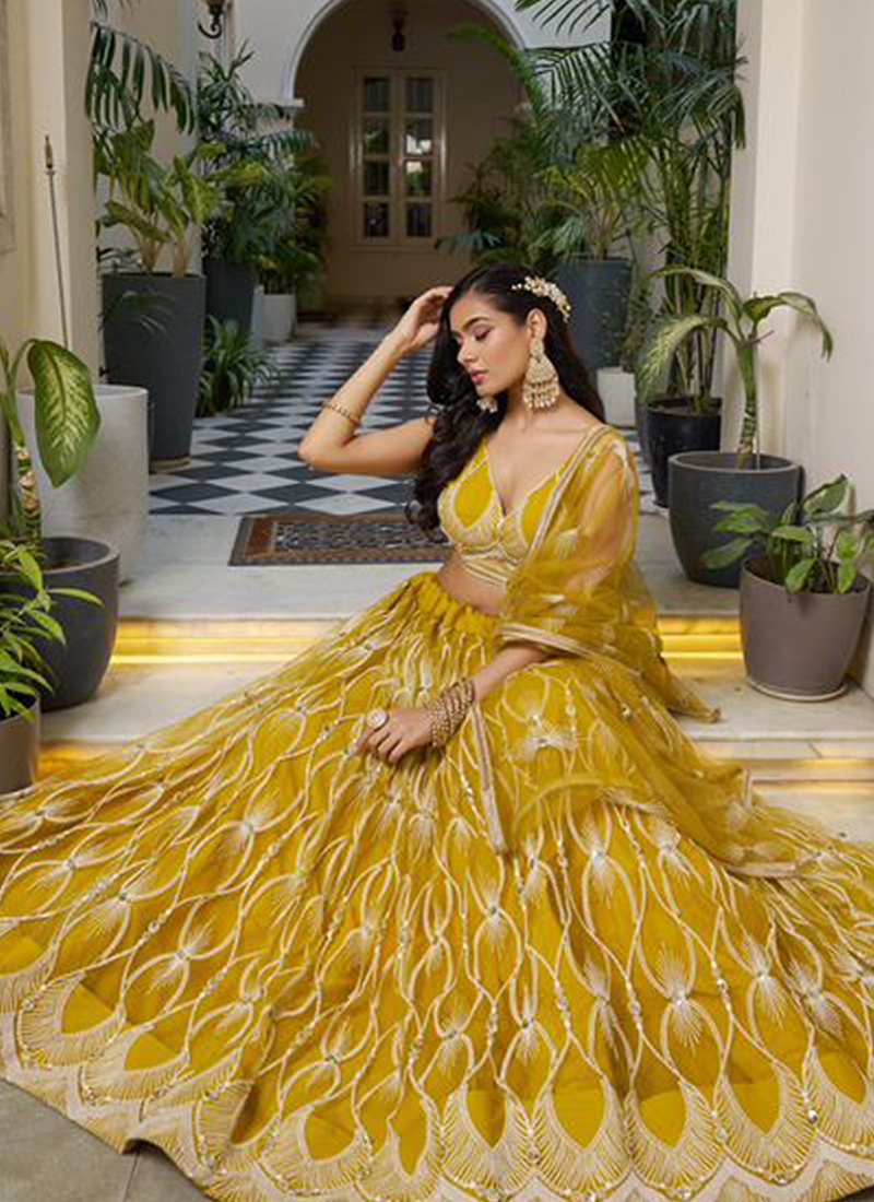 New butterfly net lehenga with heavy thread embroidery in yellow