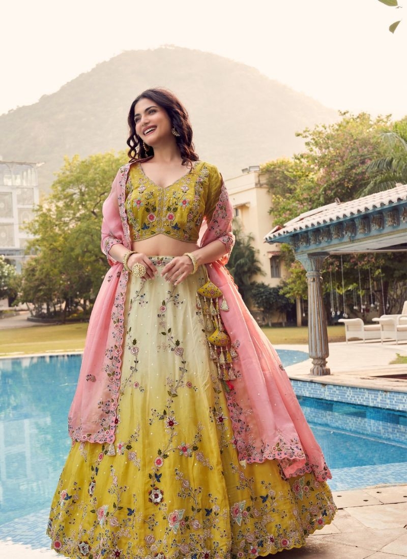 Beautiful lehenga choli with mirror and stone work in green