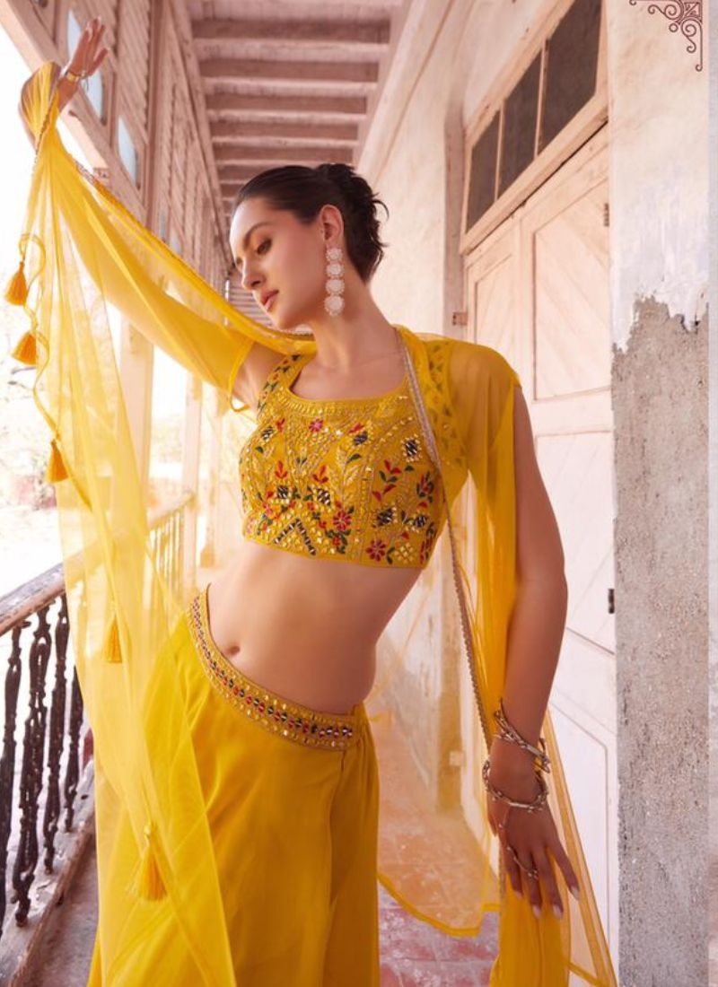 Designer georgette sharara and choli with hand embellishment in yellow
